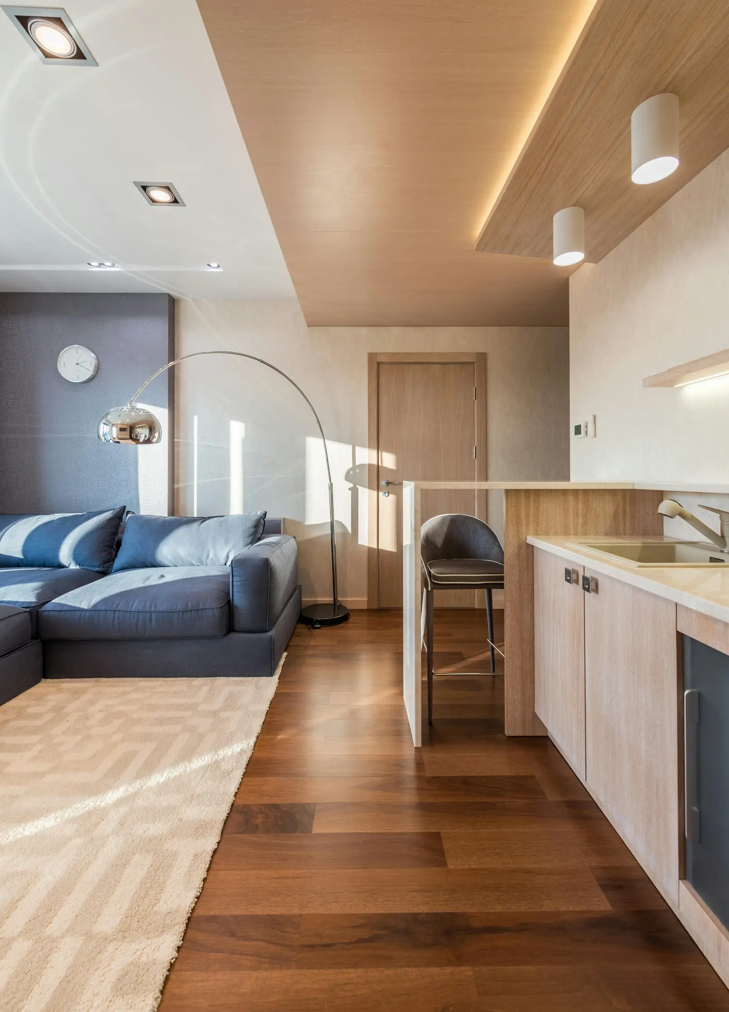 Wide-board oak flooring laid in a renovated room