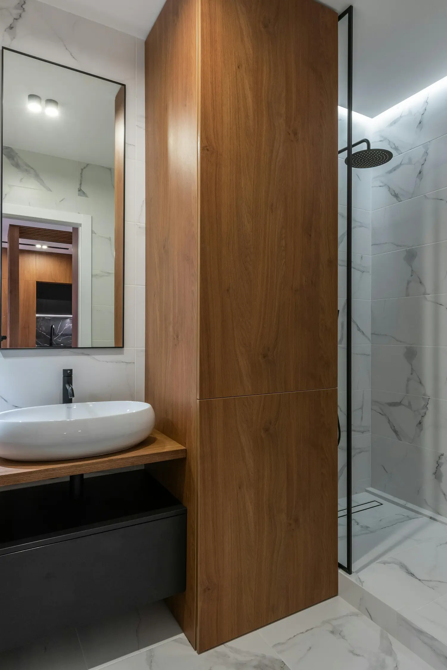 Built-in closets in a sunlit bedroom
